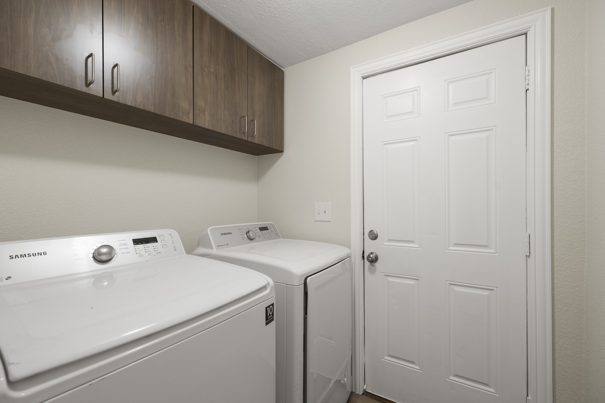 37111 Middle Trail Magnolia, TX 77354 - Photo 17 of 36 a view of storage and utility room with washer and dryer