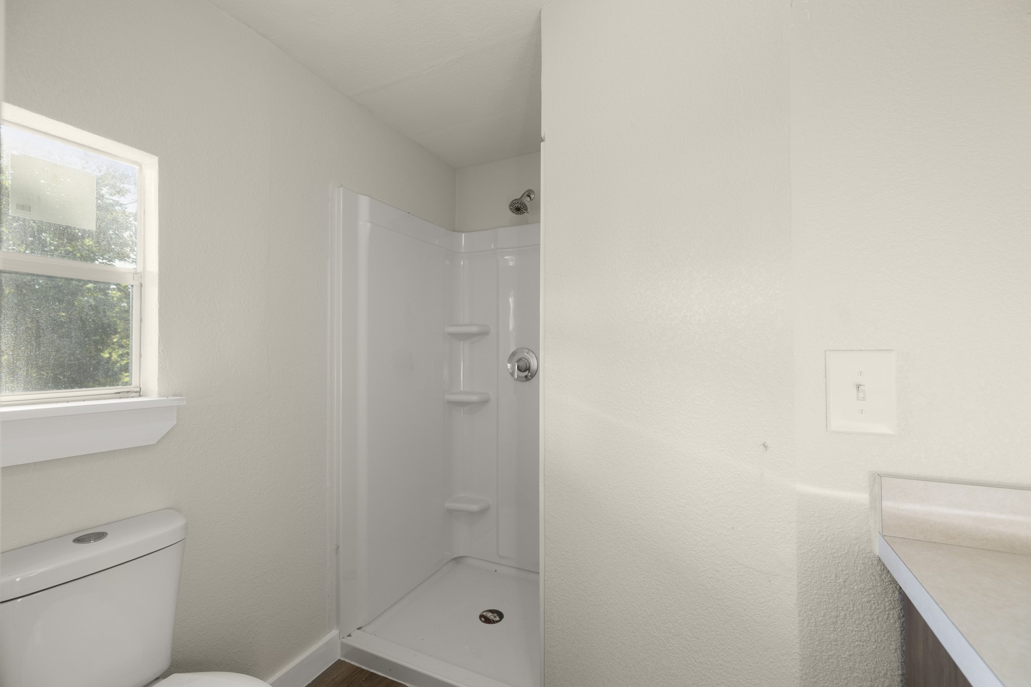 37111 Middle Trail Magnolia, TX 77354 - Photo 19 of 36 a bathroom with a shower a toilet and sink