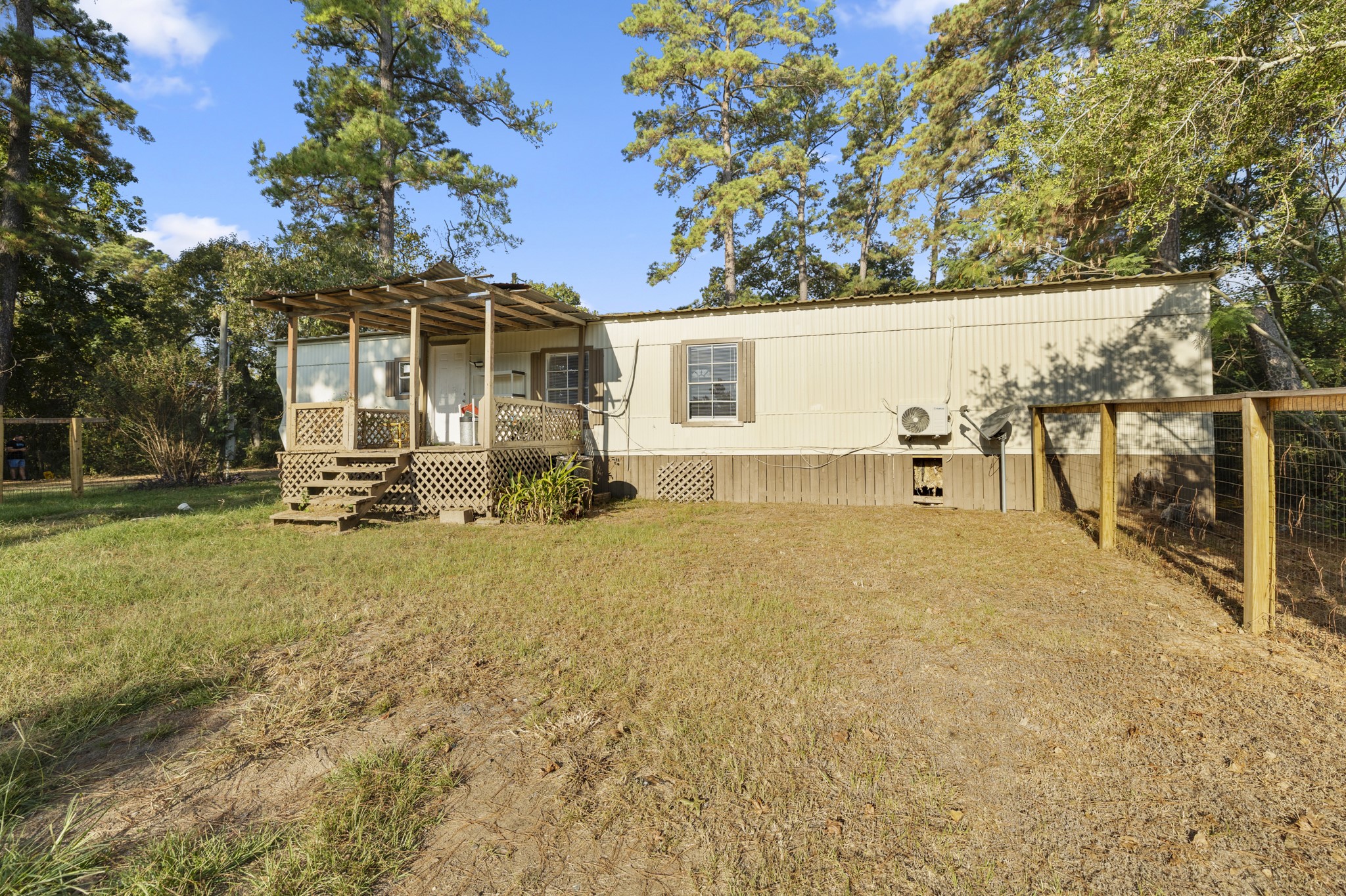 37111 Middle Trail Magnolia, TX 77354 - Photo 27 of 36 a front view of a house with a yard