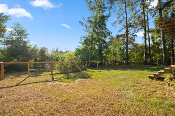 a view of backyard with slide