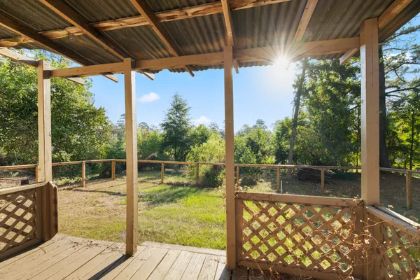a view of outdoor space with swimming pool and furniture