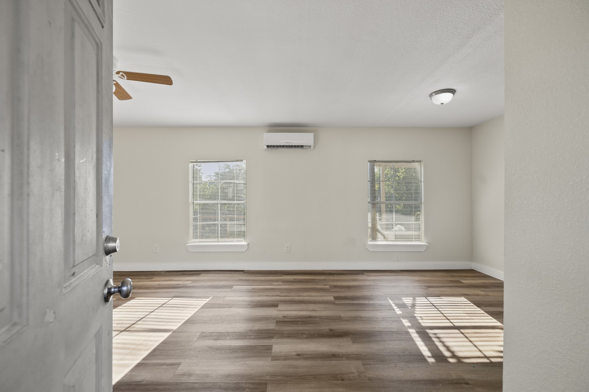 37111 Middle Trail Magnolia, TX 77354 - Photo 36 of 36 a view of an empty room with wooden floor and a window