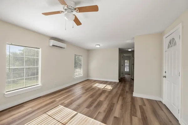 a view of an empty room with a window