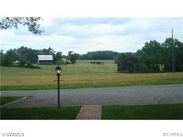 2590 Broadstreet Road Gum Spring, VA 23065 - Photo 3 of 9 a black and white photo of a field
