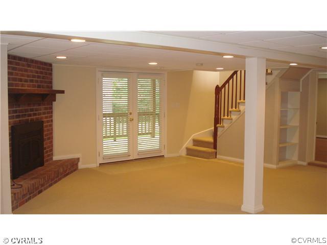 2590 Broadstreet Road Gum Spring, VA 23065 - Photo 8 of 9 a room with a bed and glass door