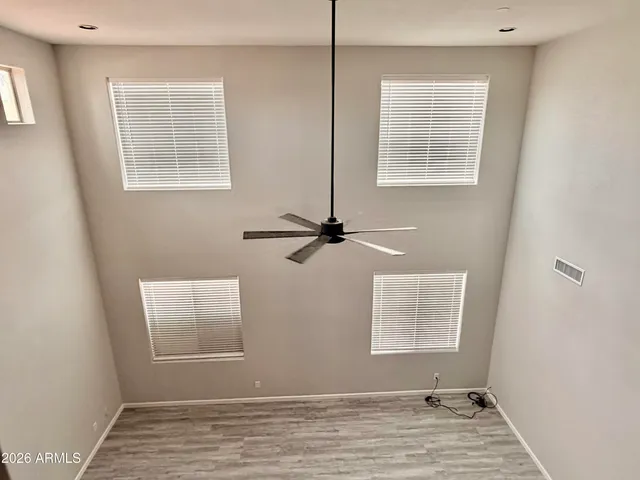 an empty room with windows