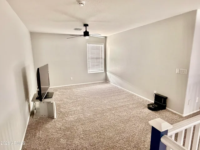 a workspace with furniture and window