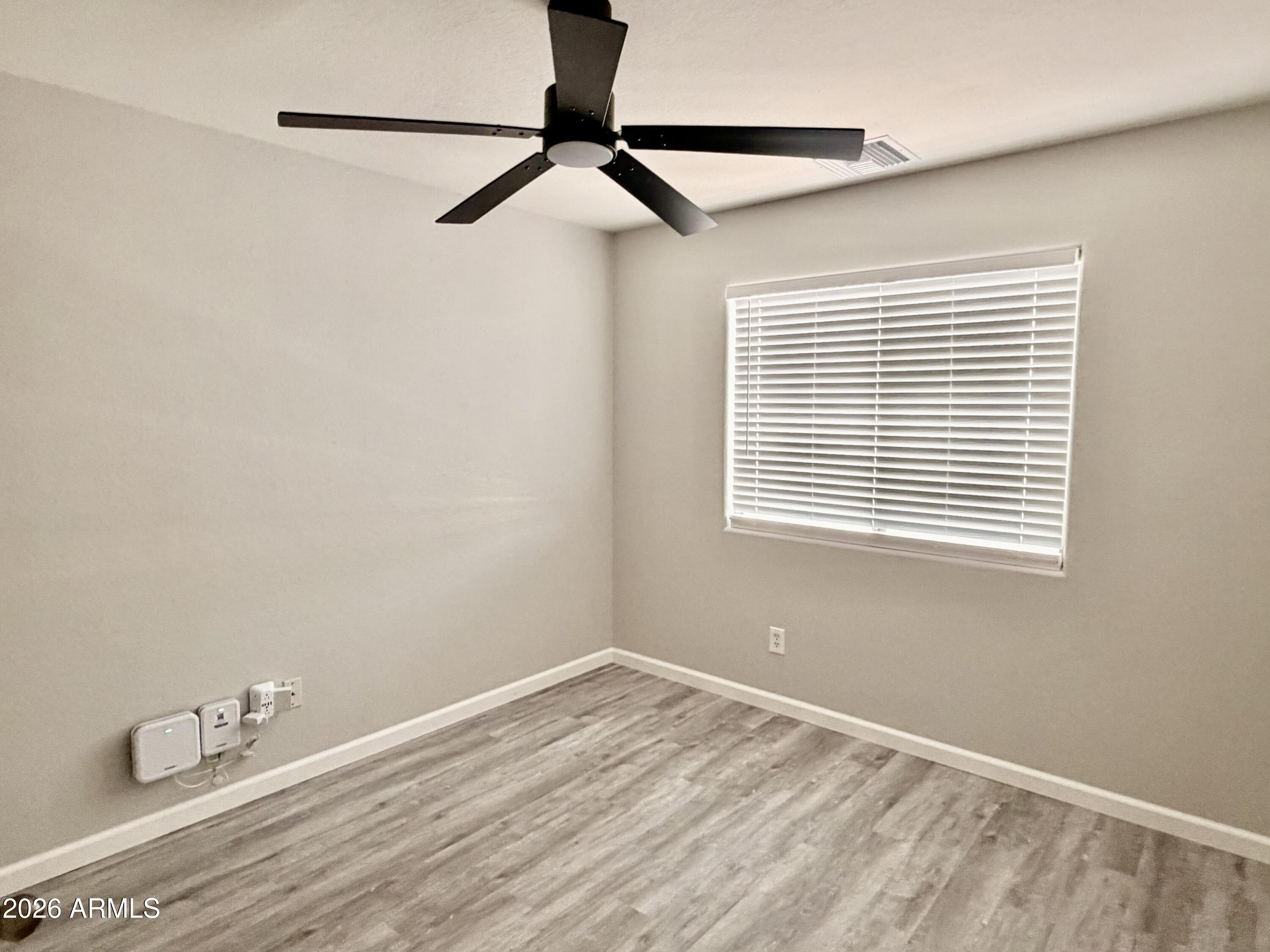 42645 West Venture Road Maricopa, AZ 85138 - Photo 22 of 37 a view of a room that has a window in it