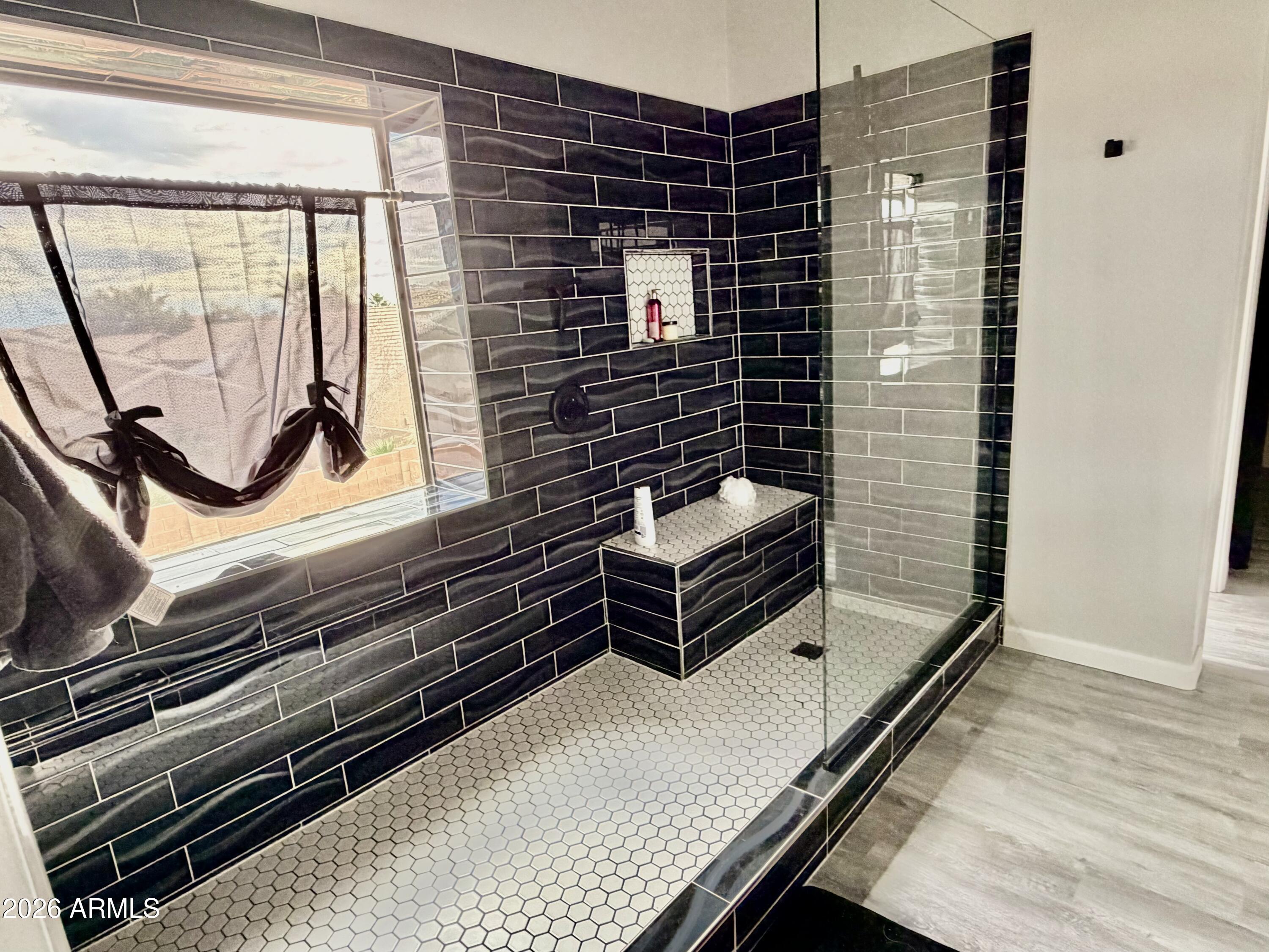 42645 West Venture Road Maricopa, AZ 85138 - Photo 27 of 37 a view of a living room and wooden floor
