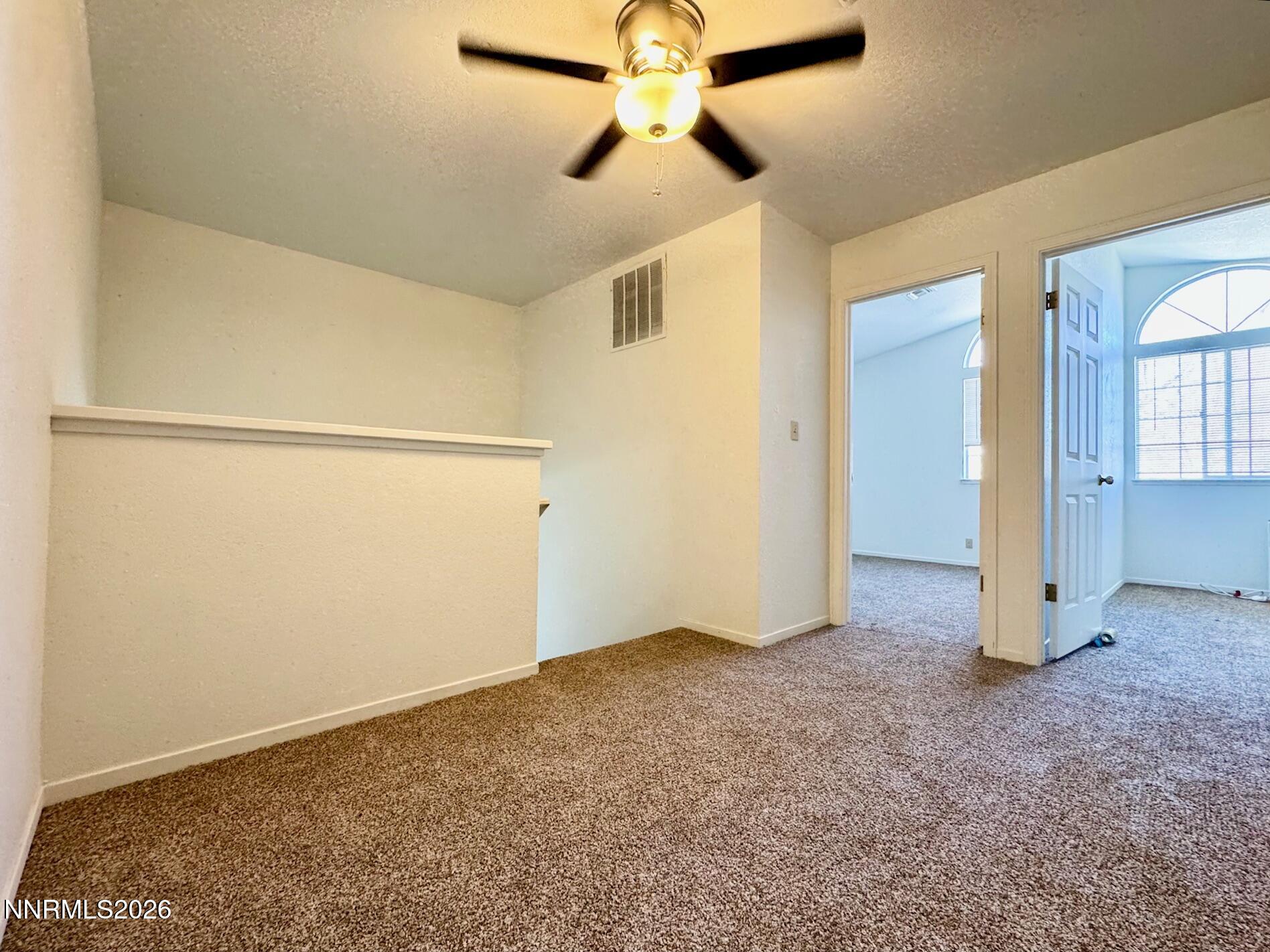 7541 Lighthouse Lane Reno, NV 89511 - Photo 12 of 24 a view of an empty room