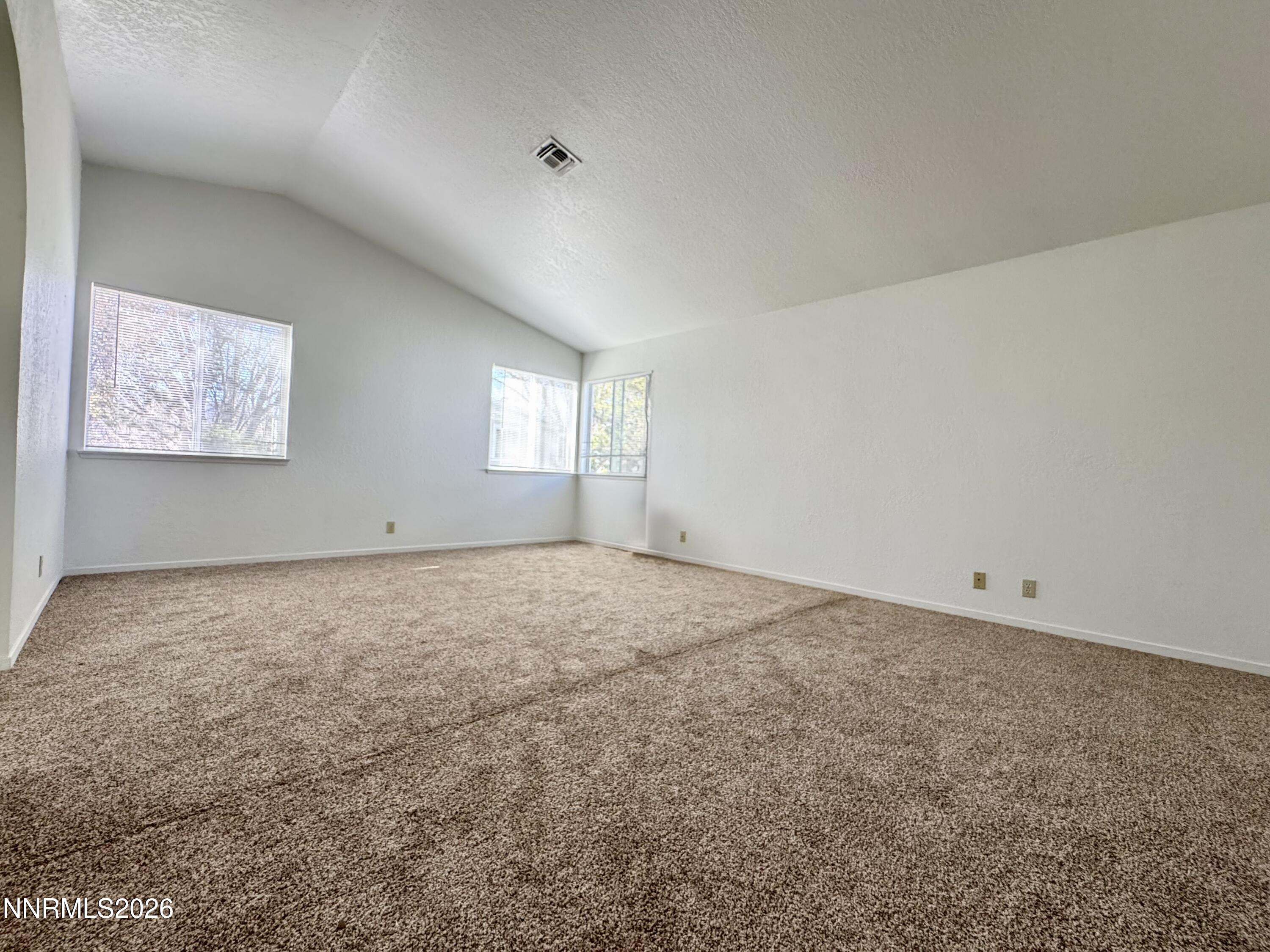7541 Lighthouse Lane Reno, NV 89511 - Photo 15 of 24 an empty room with windows and closet