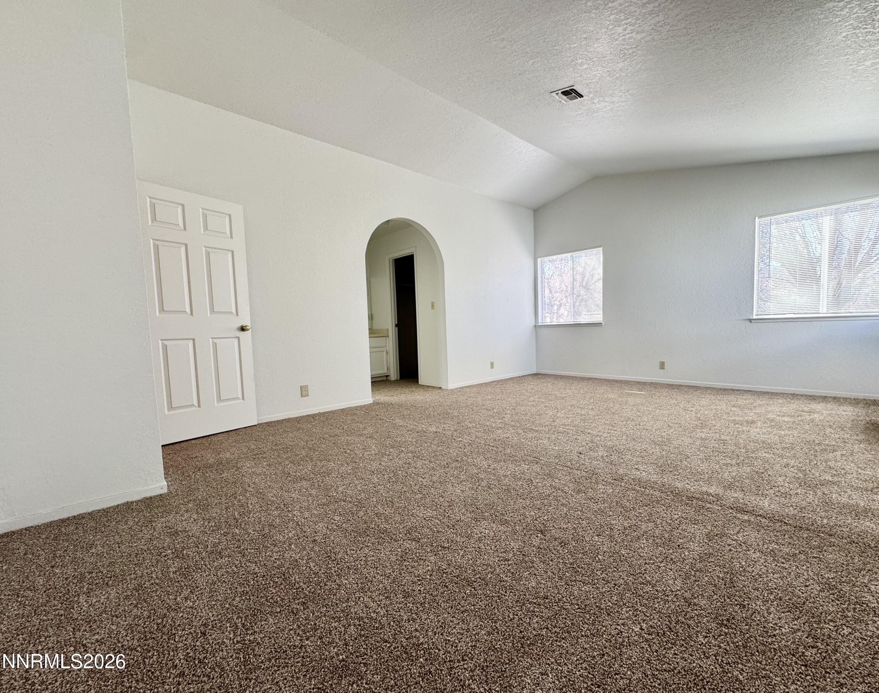 7541 Lighthouse Lane Reno, NV 89511 - Photo 16 of 24 an empty room with windows and closet