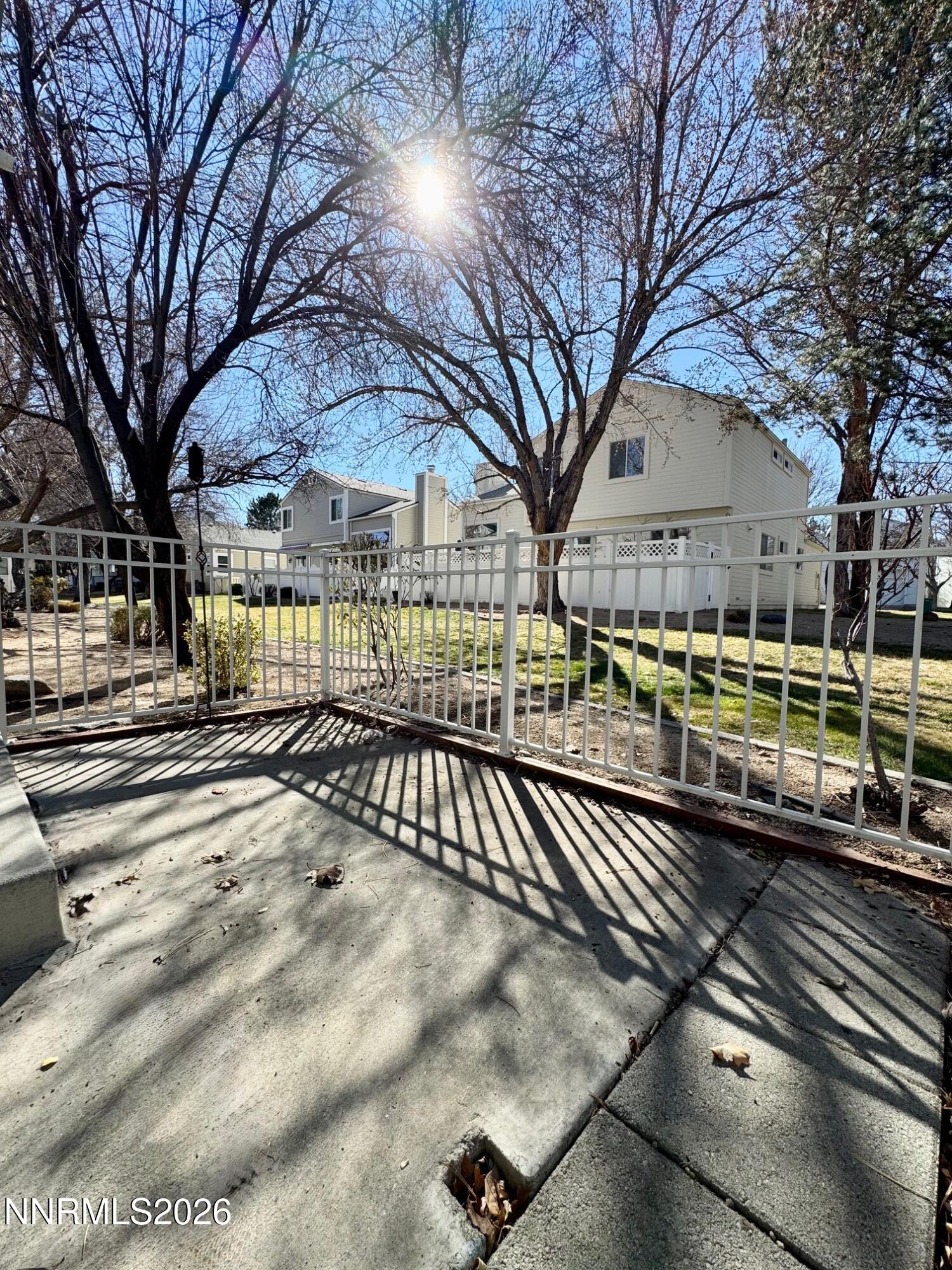 7541 Lighthouse Lane Reno, NV 89511 - Photo 23 of 24 a view of a house with a yard