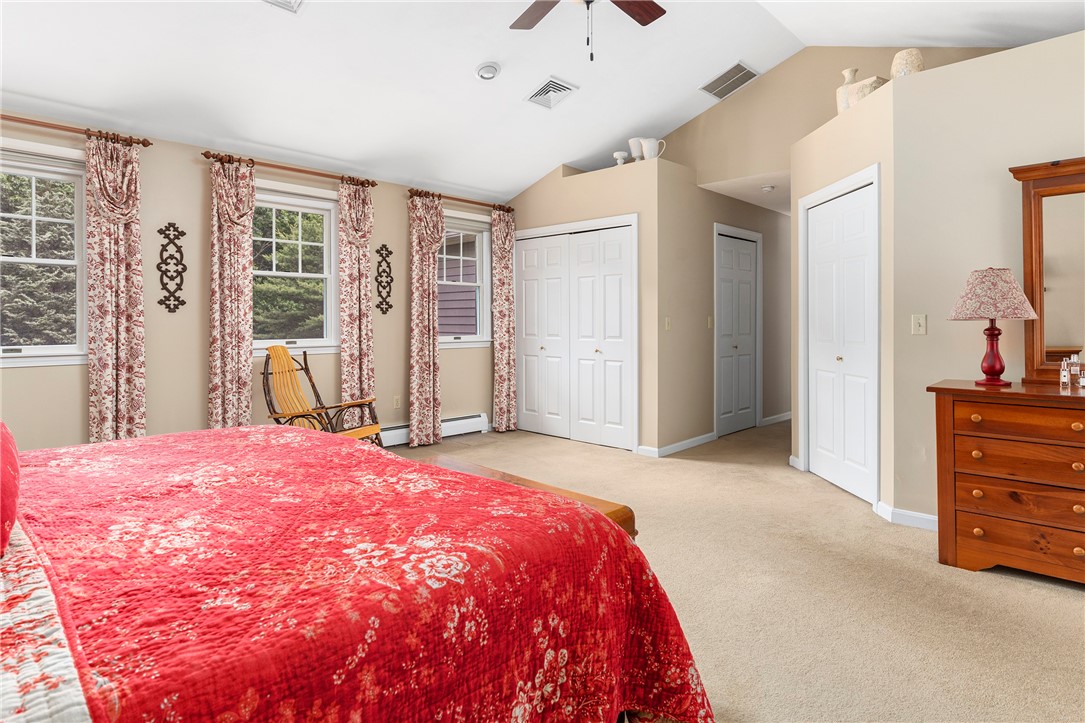 8 Howland Farm Road East Greenwich, RI 02818 - Photo 22 of 42 Primary bedroom with a walk-in closet and 2 additional closets