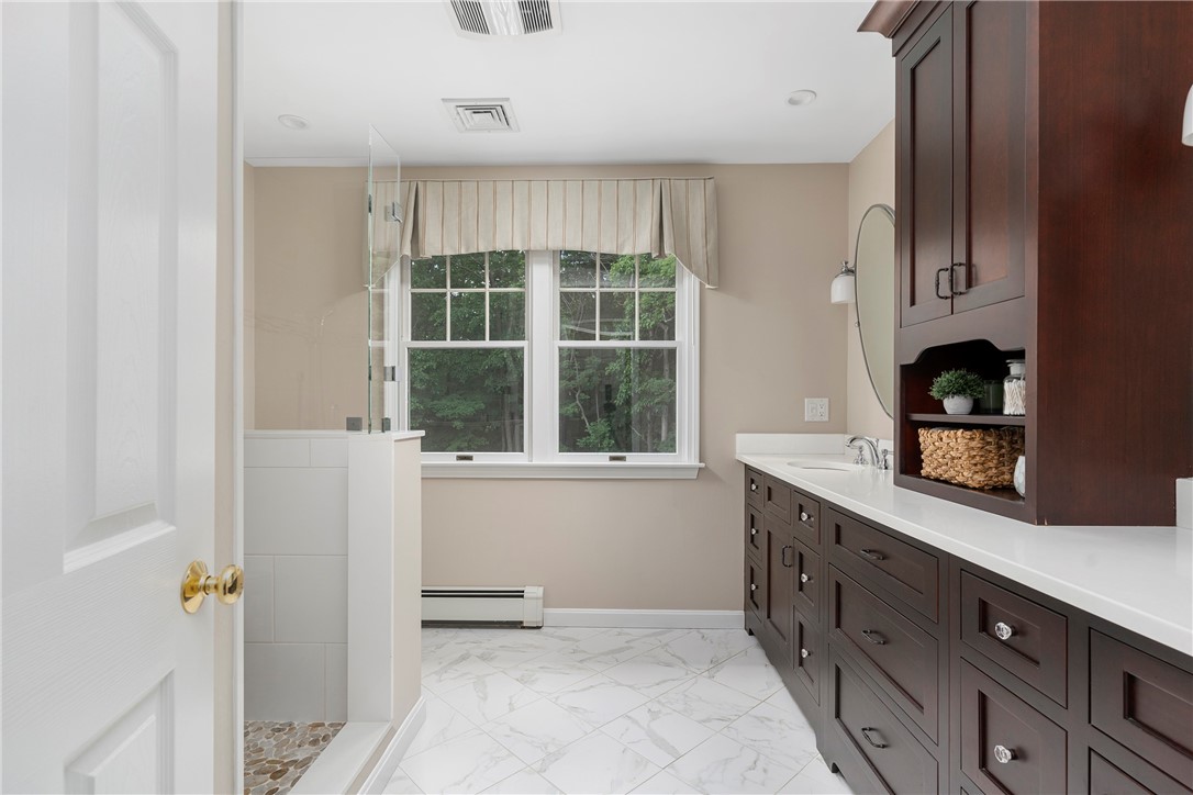 8 Howland Farm Road East Greenwich, RI 02818 - Photo 25 of 42 Beautifully renovated primary bathroom with radiant heated floors