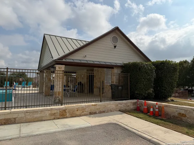 a sign board on the side of a road