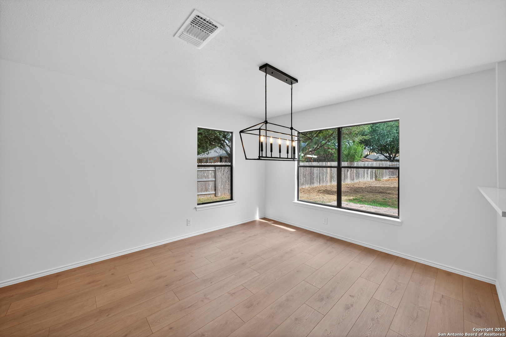 12110 Branding Point Helotes, TX 78023 - Photo 16 of 40 a view of an empty room with a window