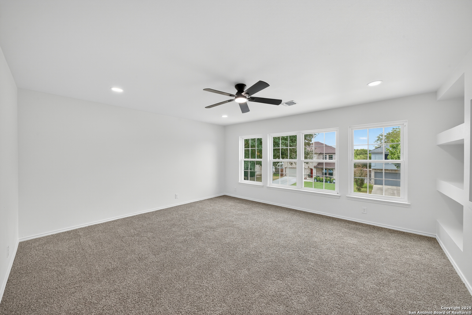 12110 Branding Point Helotes, TX 78023 - Photo 21 of 40 a view of an empty room with a window