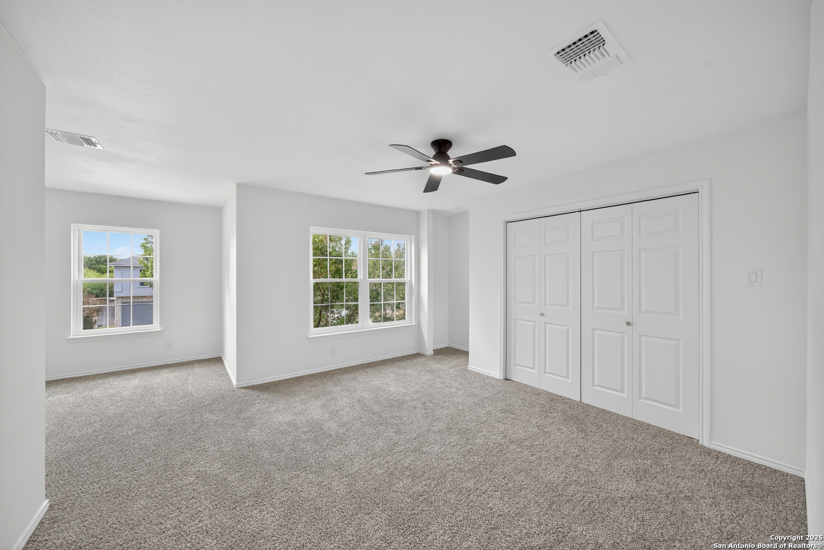 12110 Branding Point Helotes, TX 78023 - Photo 27 of 40 a view of an empty room with a window