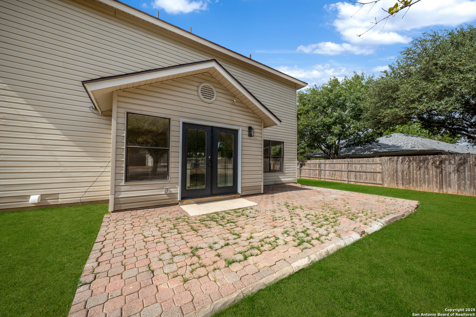 12110 Branding Point Helotes, TX 78023 - Photo 30 of 40 a view of a backyard with a garden