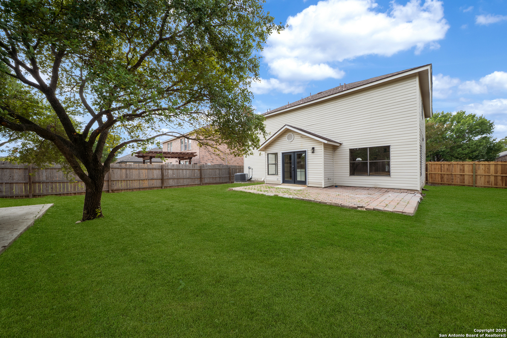 12110 Branding Point Helotes, TX 78023 - Photo 34 of 40 a view of a house with backyard