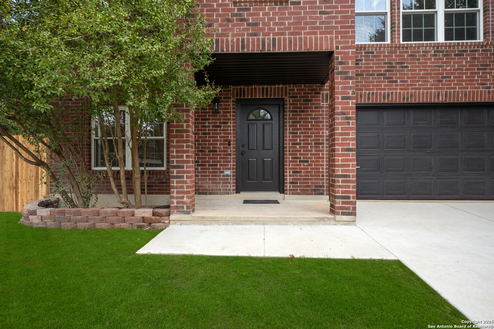 12110 Branding Point Helotes, TX 78023 - Photo 38 of 40 a view of a house with a yard