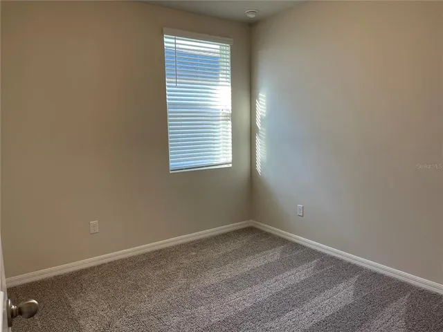 a view of a room with a window