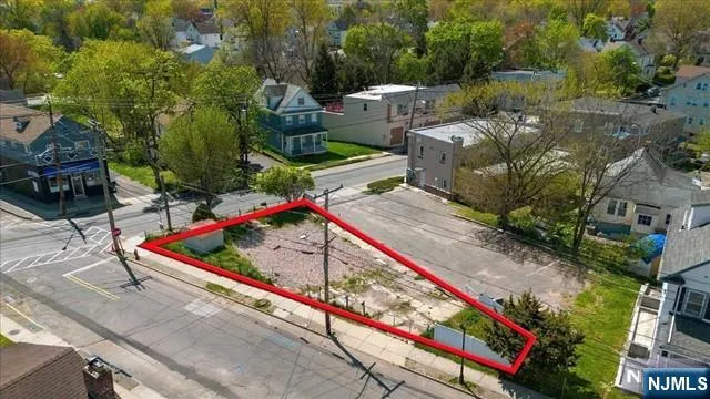 swimming pool with yard and outdoor seating