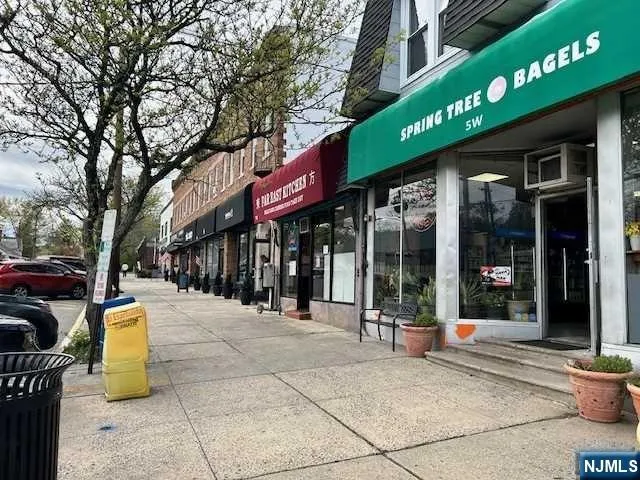 a view of a building with traffic signal