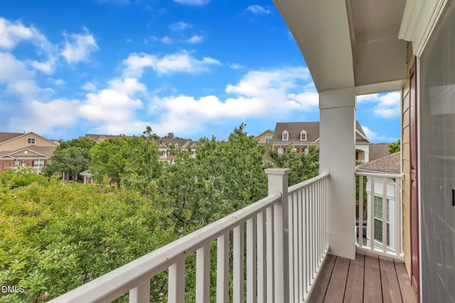 a view of a balcony with an outdoor space