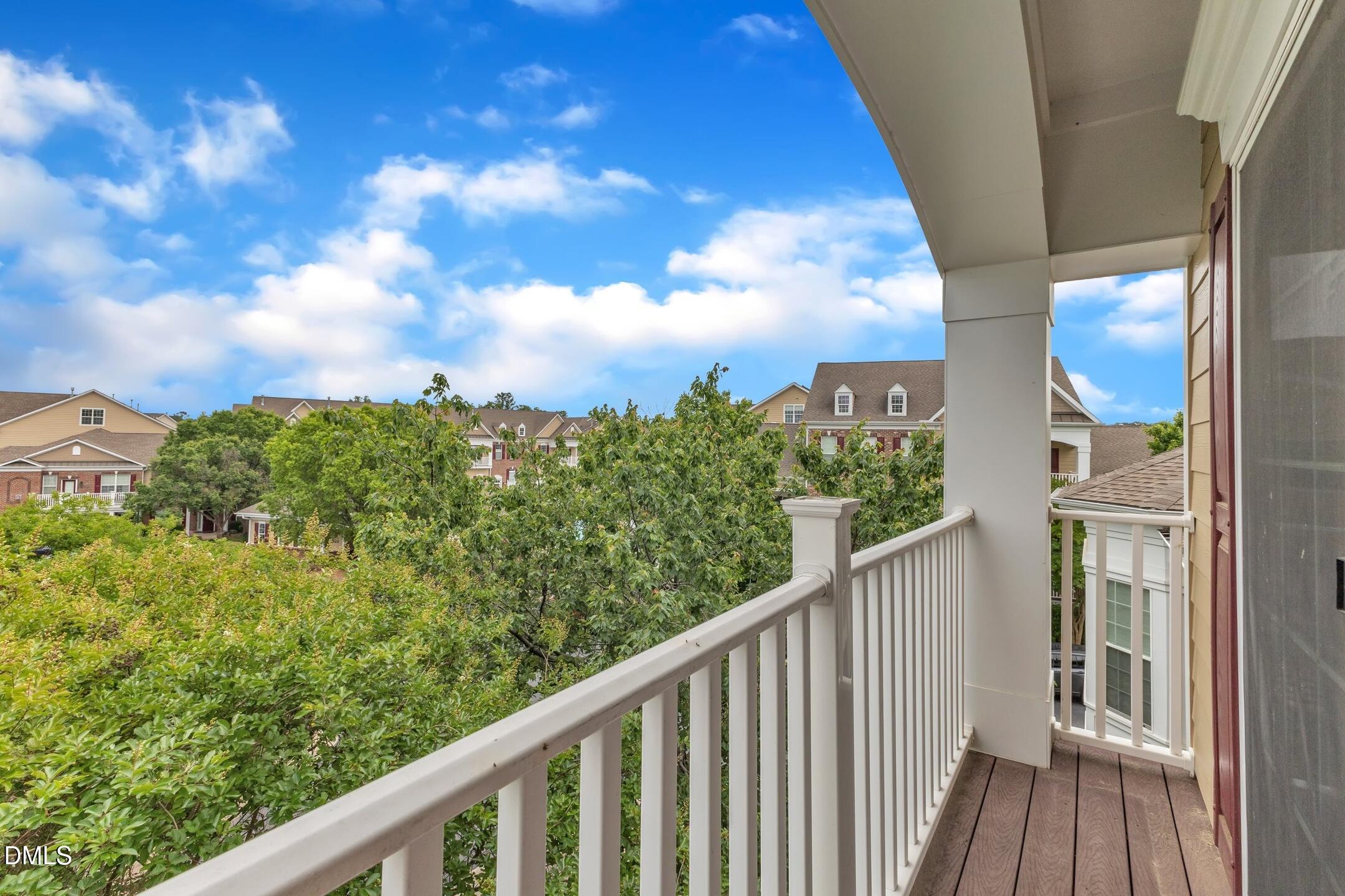 9211 Calabria Drive, Unit 104 Raleigh, NC 27617 - Photo 27 of 45 a view of a balcony with an outdoor space