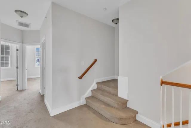 a view of entryway with stairs