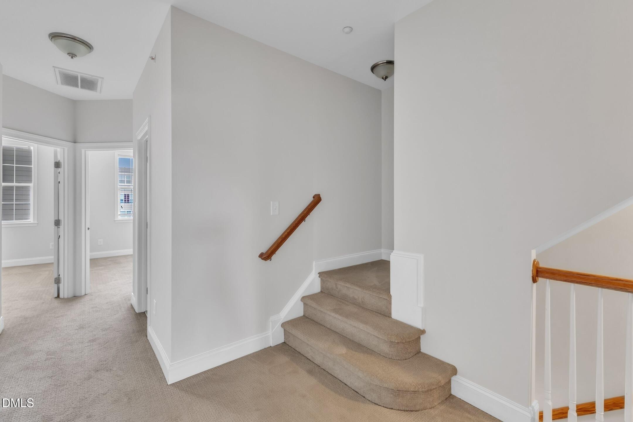 9211 Calabria Drive, Unit 104 Raleigh, NC 27617 - Photo 28 of 45 a view of entryway with stairs