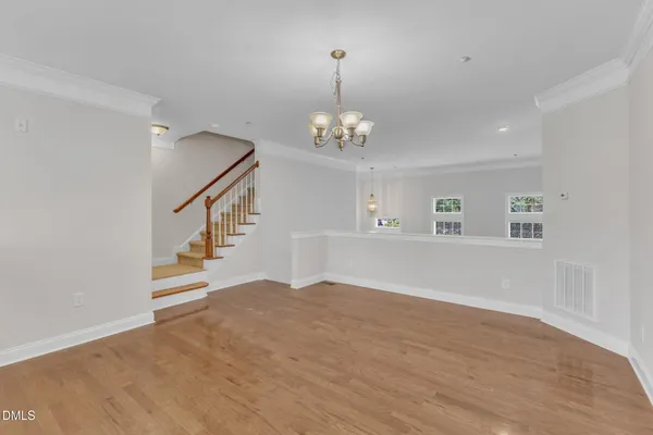 a view of entryway with wooden floor