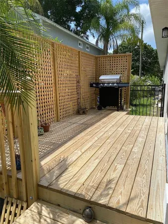 a view of a backyard of the house
