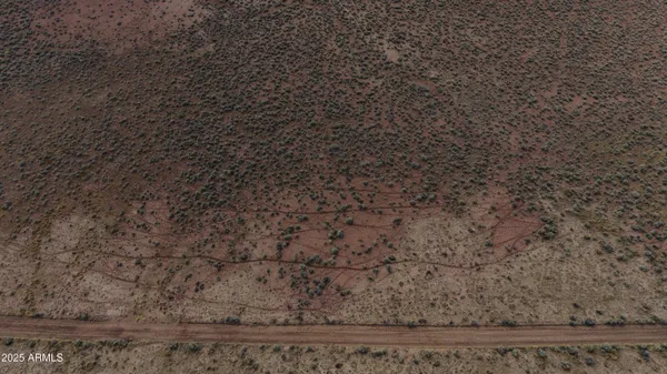a view of beach and wooden floor