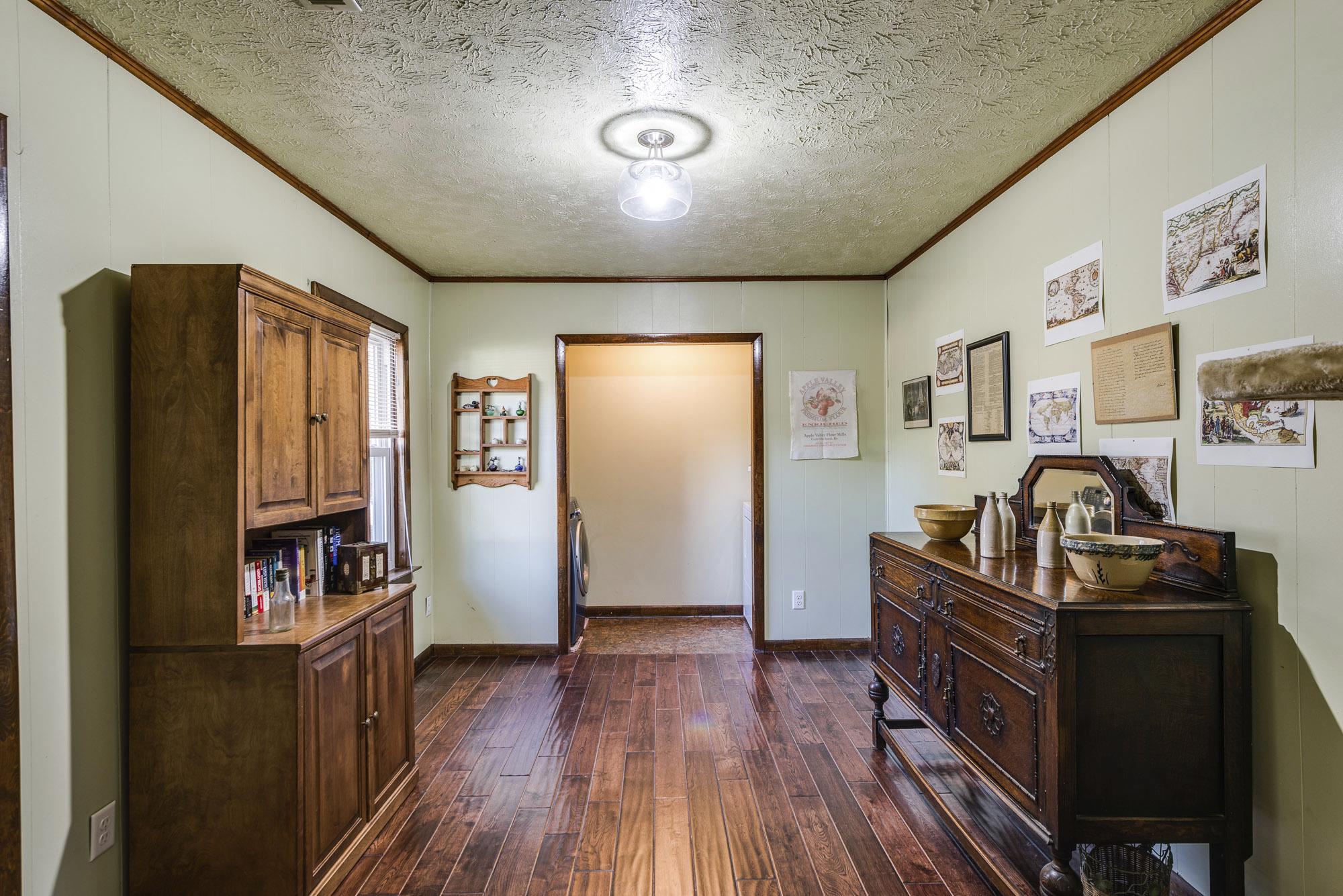 7451 Martin Road Baxter, TN 38544 - Photo 15 of 29 a living room with furniture and a flat screen tv