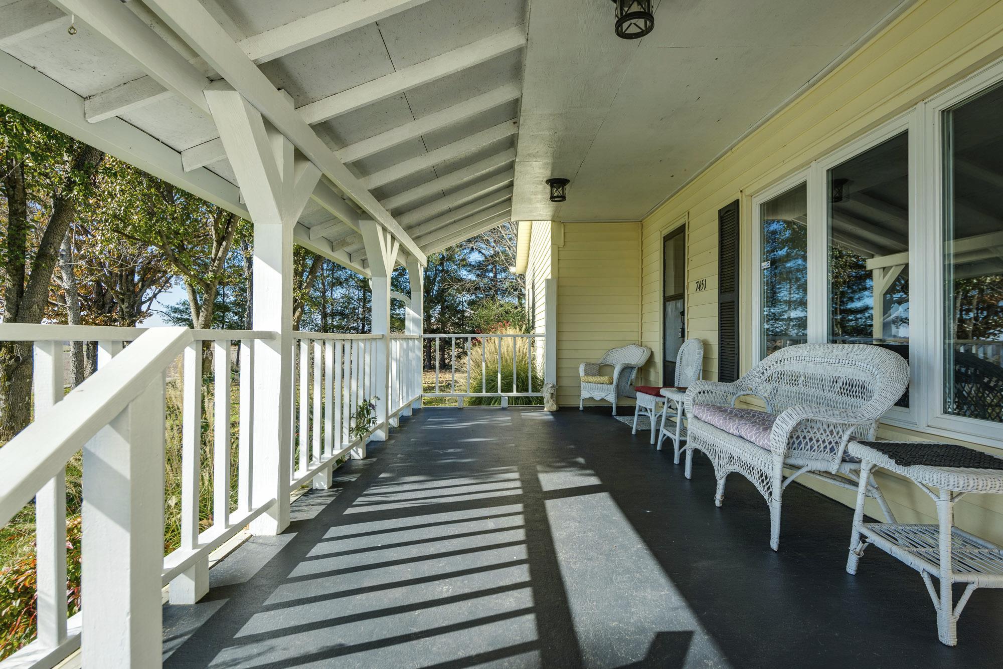 7451 Martin Road Baxter, TN 38544 - Photo 2 of 29 a view of a patio with table and chairs