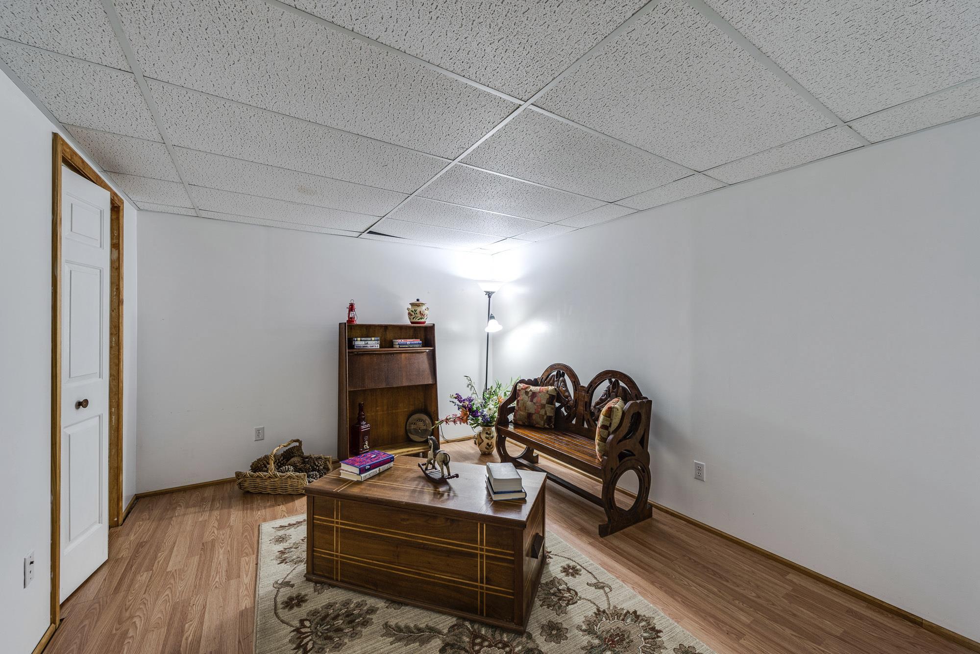 7451 Martin Road Baxter, TN 38544 - Photo 21 of 29 a room with furniture and wooden floor