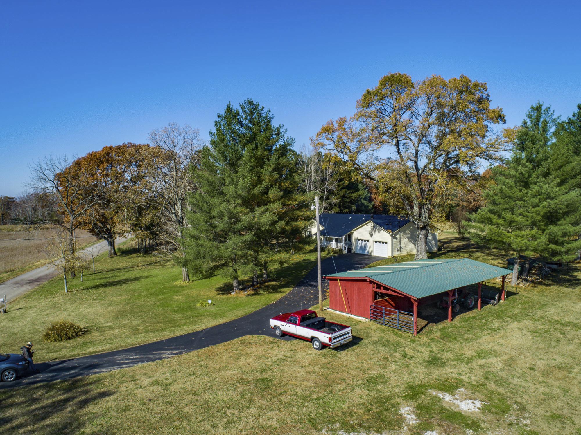 7451 Martin Road Baxter, TN 38544 - Photo 27 of 29 a view of a swimming pool with a yard