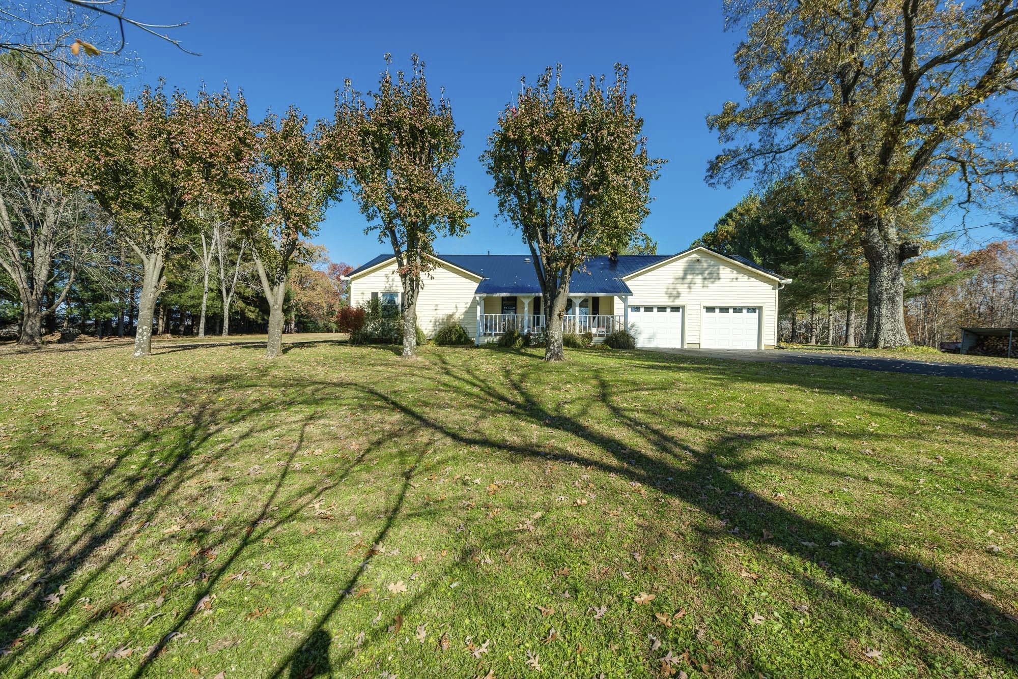 7451 Martin Road Baxter, TN 38544 - Photo 3 of 29 a house view with swimming pool in front of house