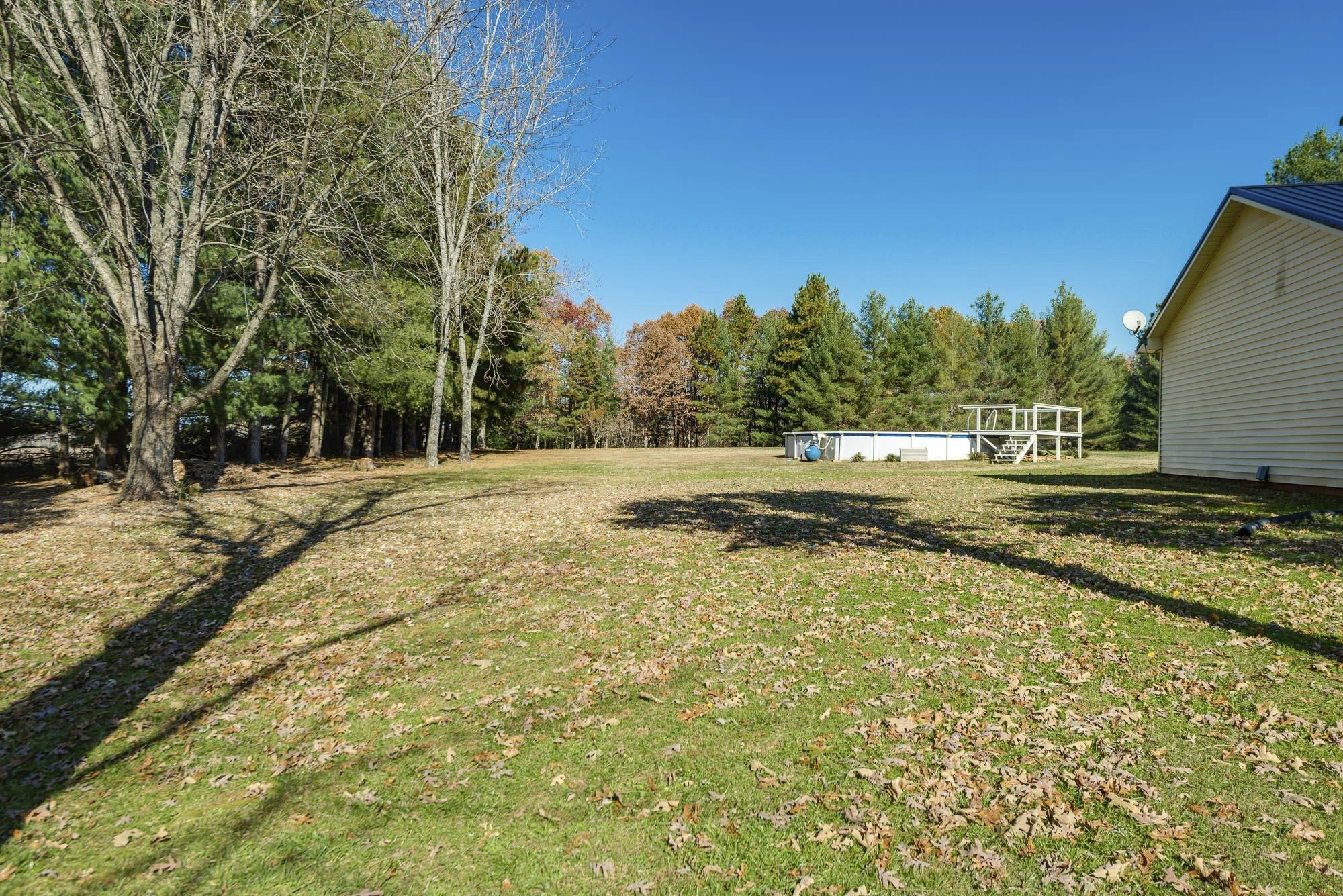 7451 Martin Road Baxter, TN 38544 - Photo 4 of 29 a view of dirt field with trees in the background