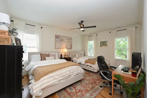 a bathroom with a toilet a sink and bathtub