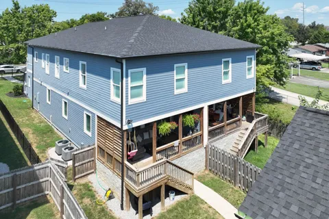 a front view of a house with garage