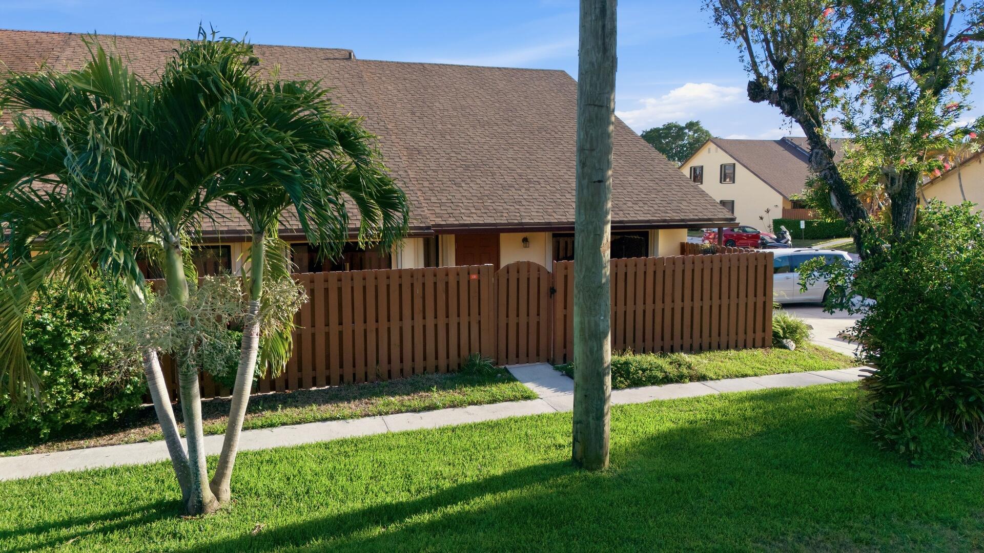 a view of backyard with green space