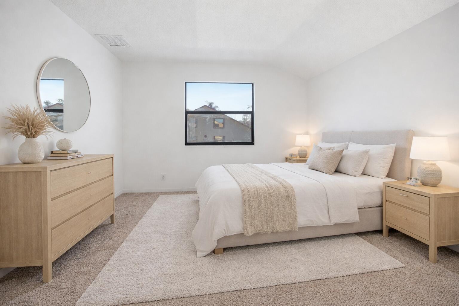 131 Springdale Circle Palm Springs, FL 33461 - Photo 13 of 19 a bedroom with a bed and a mirror