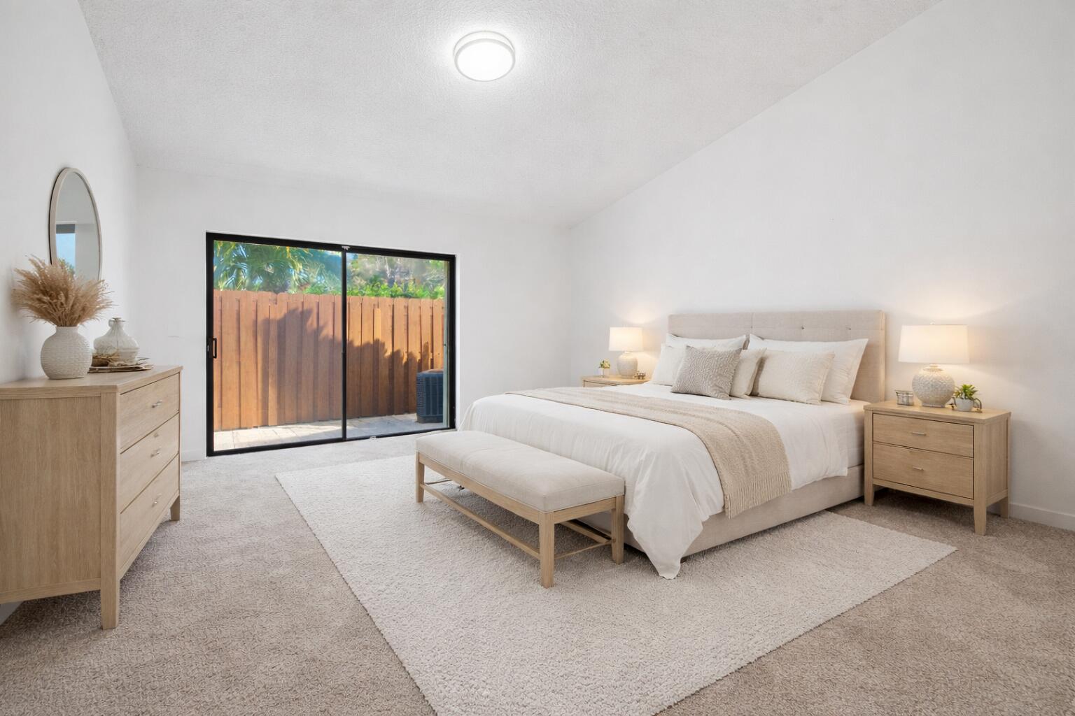 131 Springdale Circle Palm Springs, FL 33461 - Photo 10 of 19 a spacious bedroom with a bed and a dresser