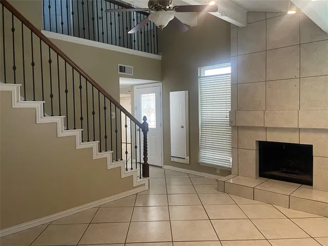 a view of an entryway with staircase