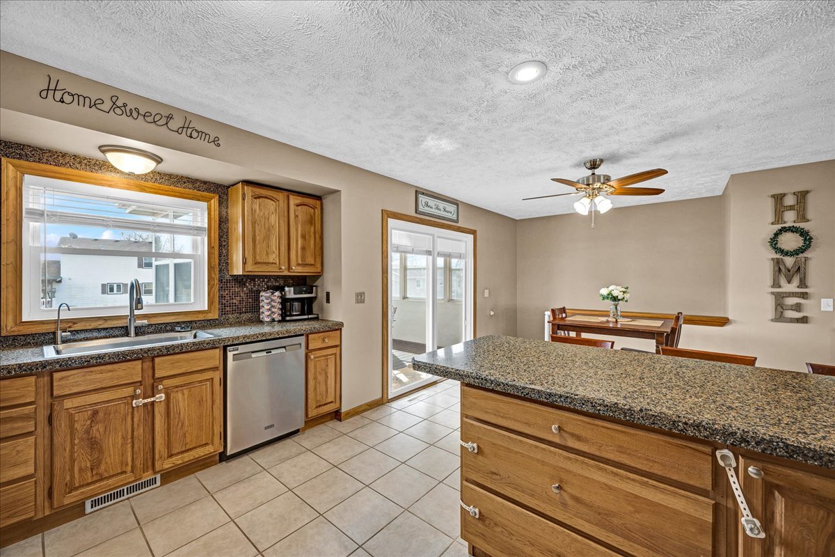 505 West North Street Danvers, IL 61732 - Photo 13 of 45 a kitchen with a sink appliances and cabinets