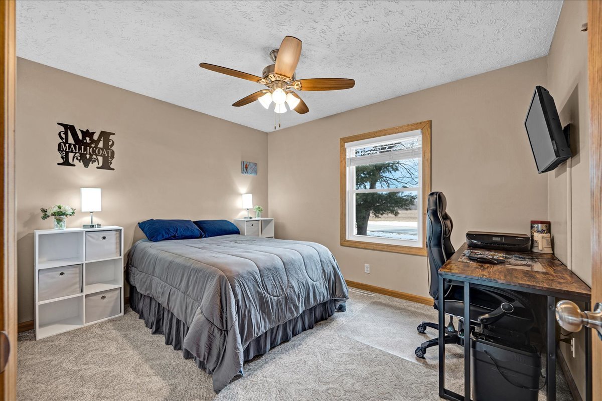 505 West North Street Danvers, IL 61732 - Photo 19 of 45 a bedroom with a bed and a window